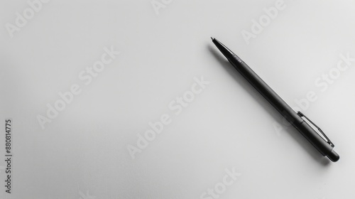 A black pen on an empty white page