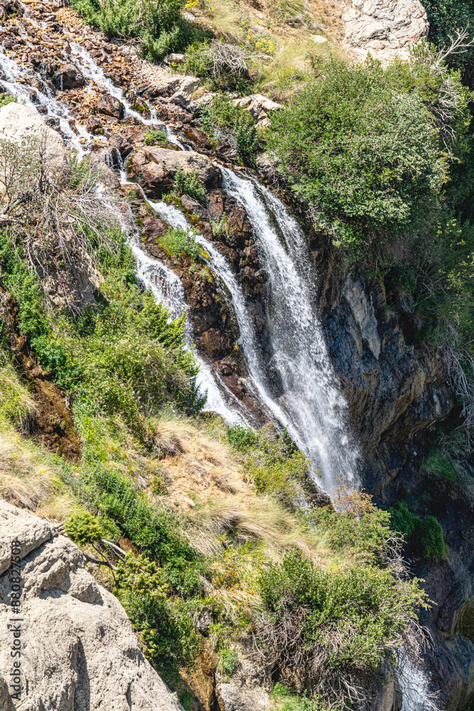The scenic views of Gömbe Uçarsu Waterfall which fly like a white cloud down the rocks at an altitude of about 50 meters, with a cave underneath, Gömbe, Kaş, Antalya The scenic views of Gömbe Uçarsu Waterfall which fly like a white cloud down the rocks at an altitude of about 50 meters, with a cave underneath, Gömbe, Kaş, Antalya