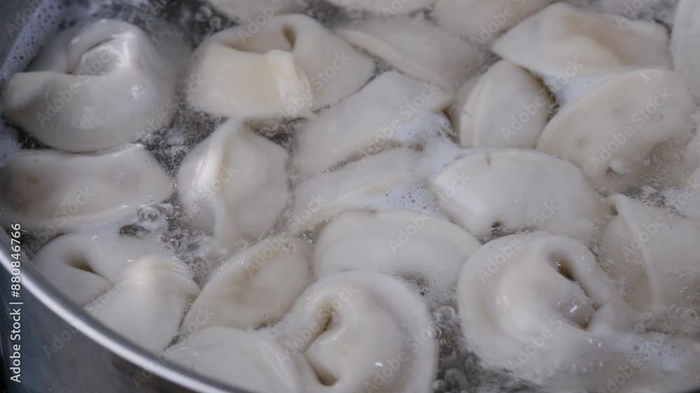 dumplings are cooked in a saucepan dumplings are cooked in a saucepan
