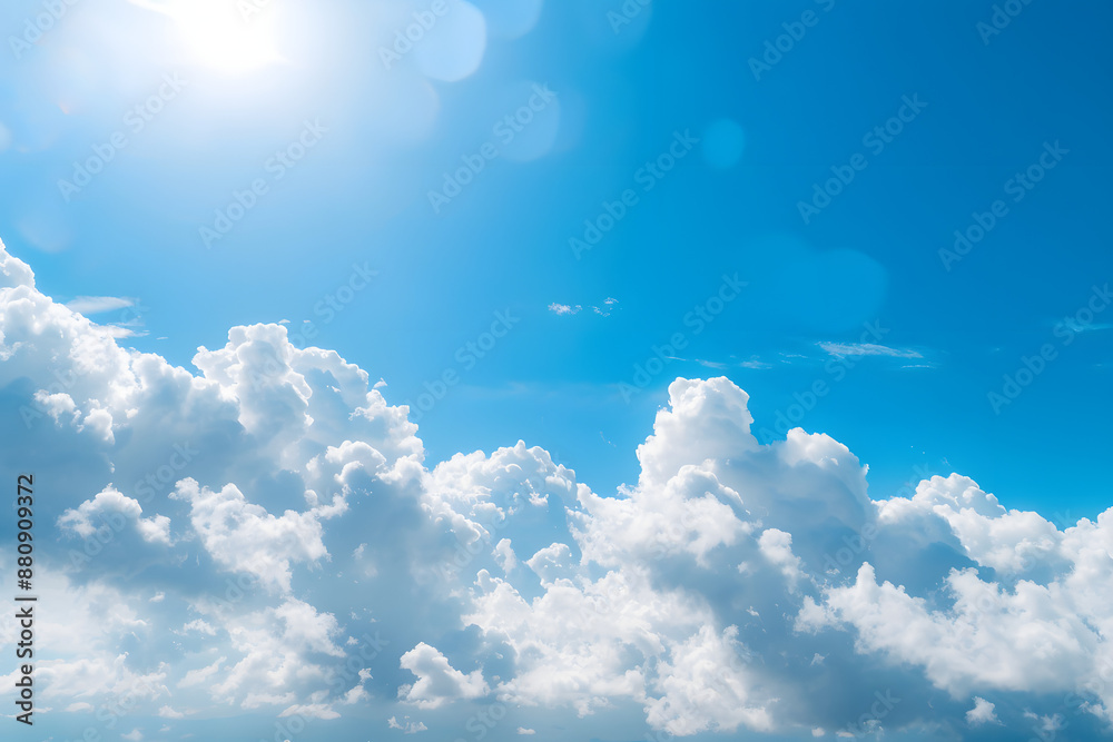 The blue summer sky with white fluffy clouds. Photo from window on the airplane. The blue summer sky with white fluffy clouds. Photo from window on the airplane.