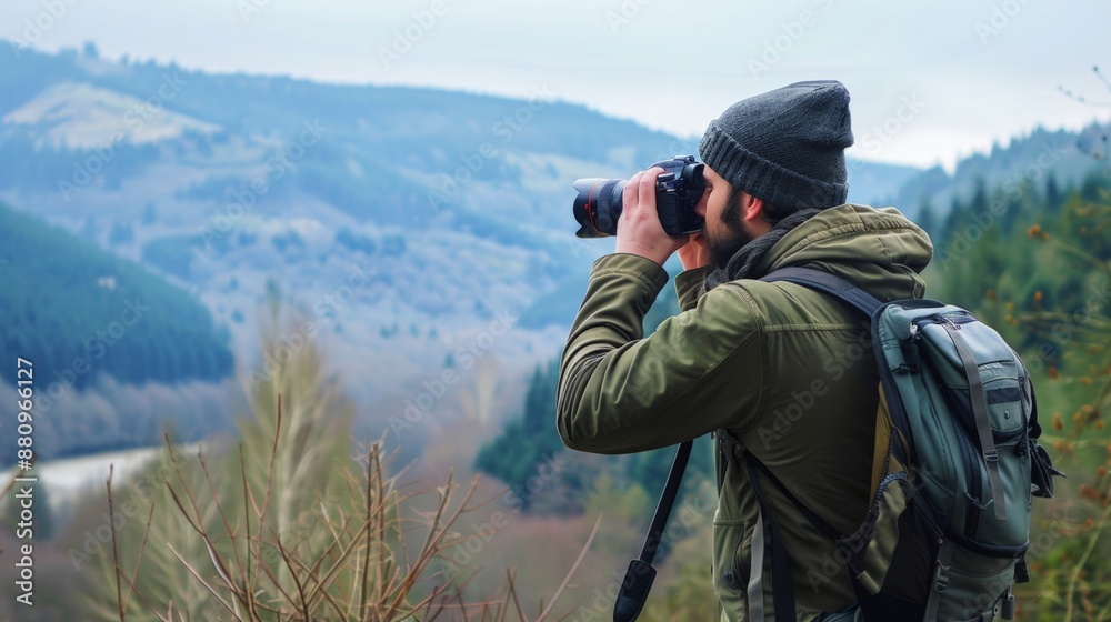 photographer with camera and tripod taking pictures of mountain landscape photographer with camera and tripod taking pictures of mountain landscape