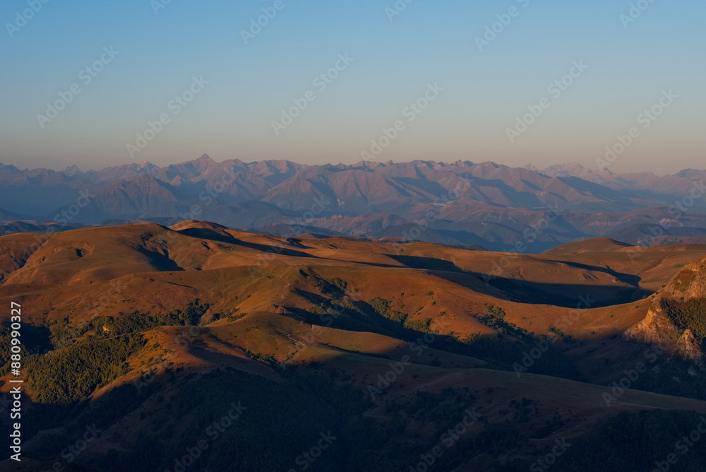 Naklejka premium Russia, the Elbrus region. Stunning dawn view of the Caucasus mountains from the cliffs of the Bolshoy Bermamyt plateau.