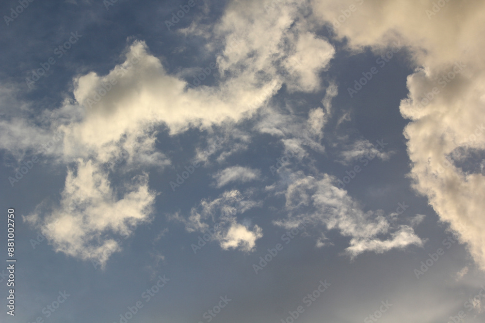 Obraz premium clouds with different shapes evening sunset 