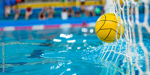 Water polo ball hitting net, scoring goal, wide banner, copyspace photo