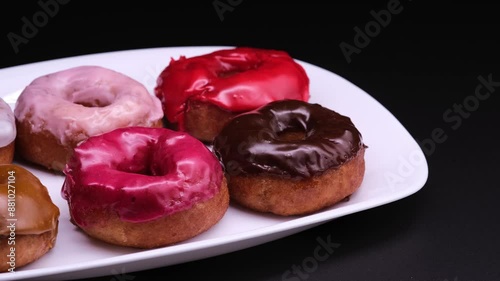 lots of different colored donuts