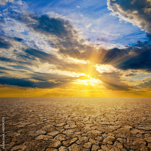 dry cracker earth at the dramatic sunset