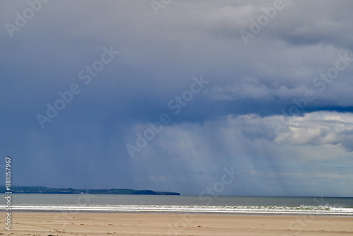 empty beach storm clouds rain coming
