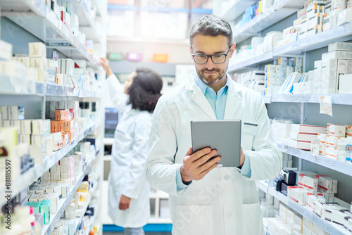 Bild auf Leinwand Man, pharmacy and tablet with reading for inventory, stock or drugs for order from supplier