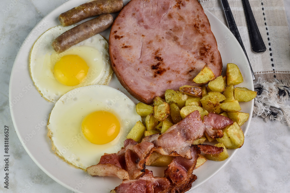 fried eggs with ham, bacon and sausage fried eggs with ham, bacon and sausage