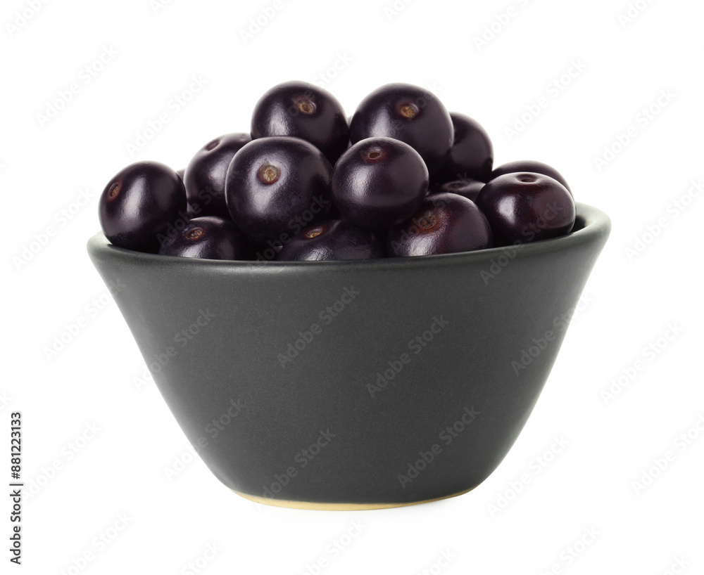 Fresh ripe acai berries in bowl isolated on white Fresh ripe acai berries in bowl isolated on white