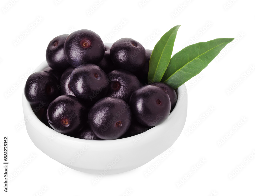 Fresh ripe acai berries in bowl and green leaves isolated on white Fresh ripe acai berries in bowl and green leaves isolated on white