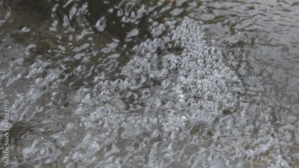 beautiful water bubbles in natural spring water. close up.