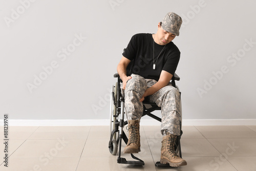 Young soldier in wheelchair...