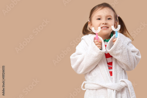 Happy little girl in bathro...