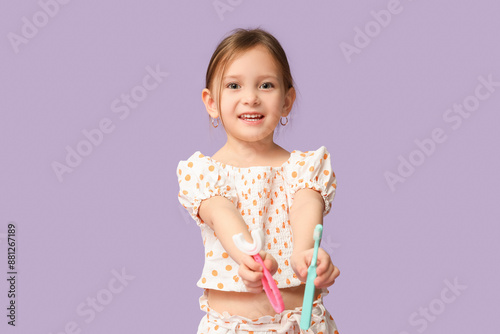 Happy little girl in pajama...