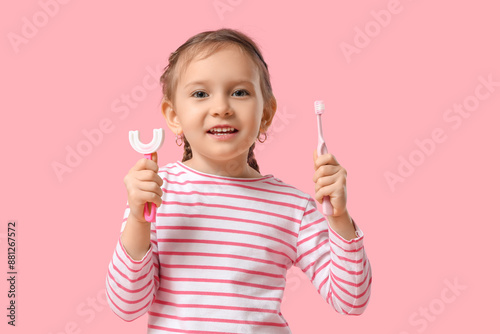 Happy little girl with toot...