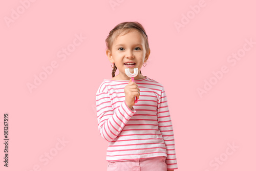 Happy little girl with toot...
