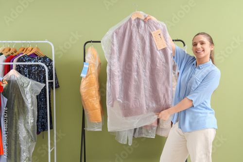 Young female worker of dry-...