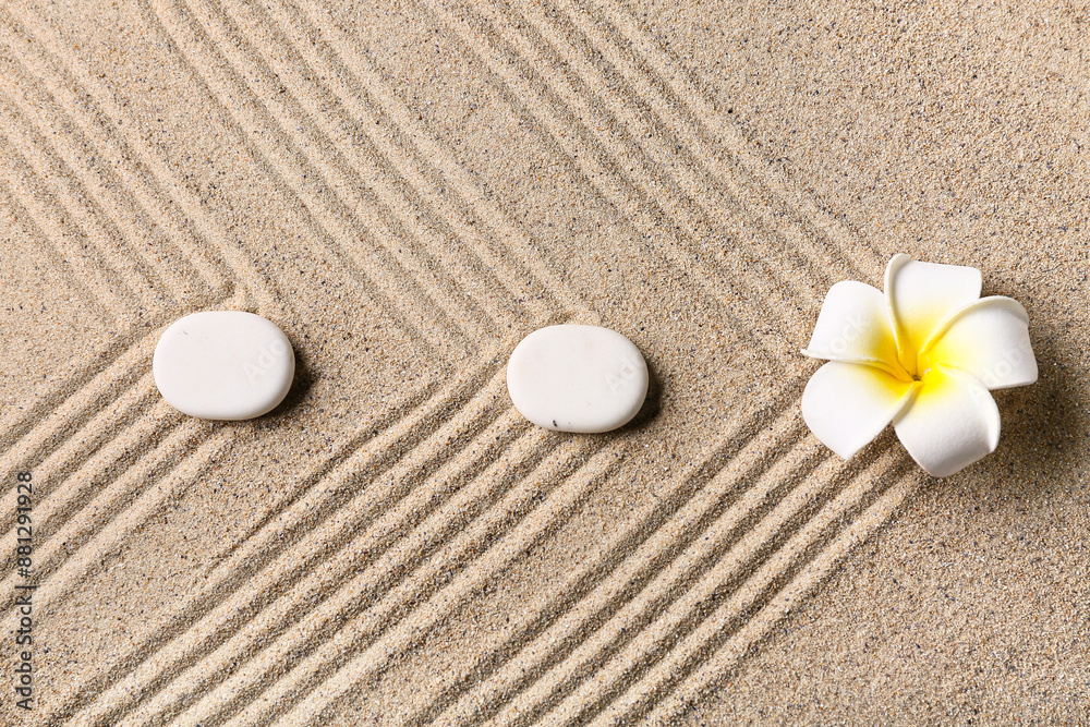 Stones and plumeria on sand. Zen concept Stones and plumeria on sand. Zen concept