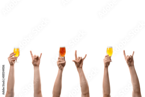Raised hands holding beer g...