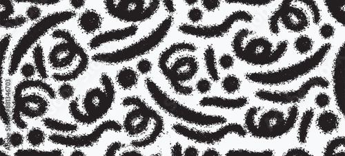 Seamless spray paint ink doodle pattern for children's birthday party or celebration background, trendy design with doodle shapes on black background.
