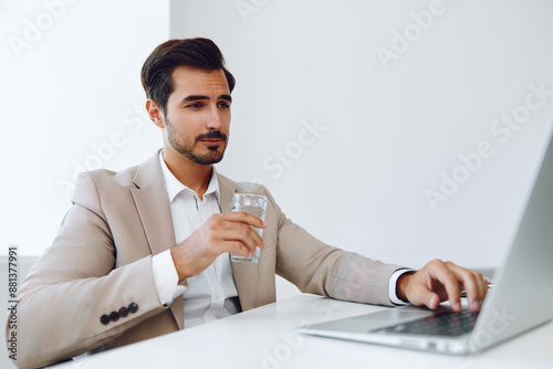 Winner man laptop businessman happy office business technology