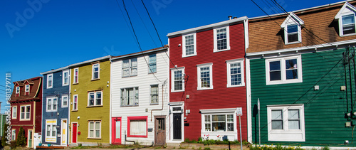 They are known as Jellybean Houses due to their colorful and varied exteriors. The term 