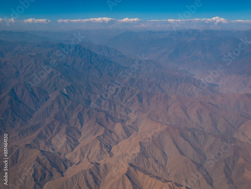 Obraz na płótnie View From the Airplane of the Rocky Mountains Over Peru with a Blue Sky as a Background w salonie
