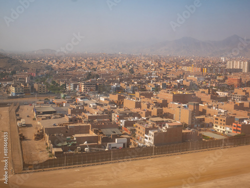 Obraz na płótnie View of the City, Dry and Yellow Ground with a Cloudy and Polluted Sky in Lima, Peru w salonie