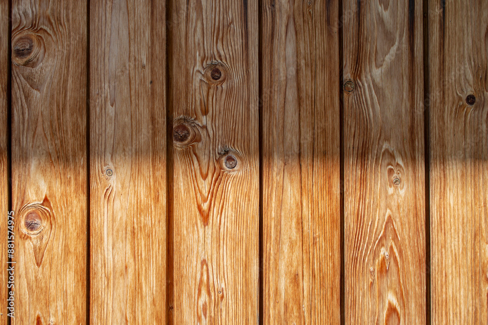 Naklejka premium Vertical wooden boards with horizontal half sunlight pattern, abstract wallpaper texture
