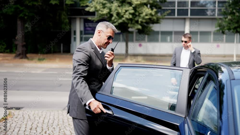 Professional Bodyguards Ensuring Safety for High-profile Businessman Professional Bodyguards Ensuring Safety for High-profile Businessman