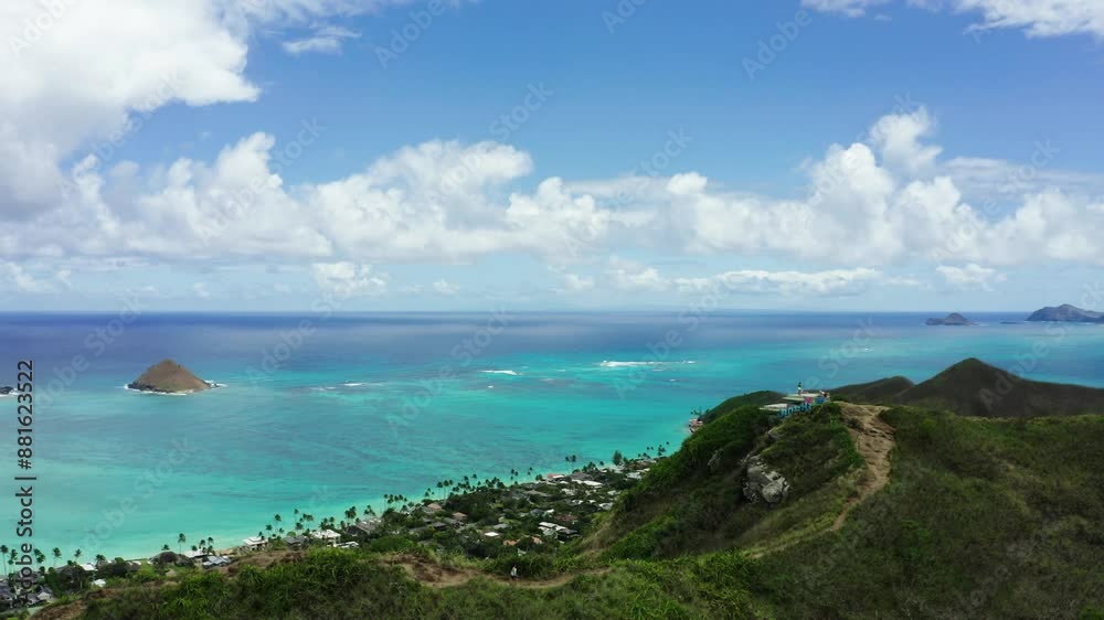 Parallaxing drone shot of Lakinai Pillbox viewpoint and Oahu's warm coastal waters. Parallaxing drone shot of Lakinai Pillbox viewpoint and Oahu's warm coastal waters.