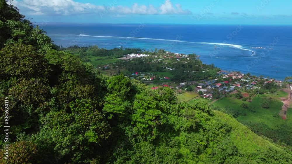 Teahupoo Tahiti aerial drone over mountains view French Polynesia coastline town village new Olympic 2024 sunny surf waves channel Point boats river Faremahora Pass Havae forward pan up slowly