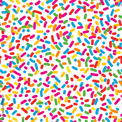 Seamless pattern featuring colorful confetti sprinkles scattered background