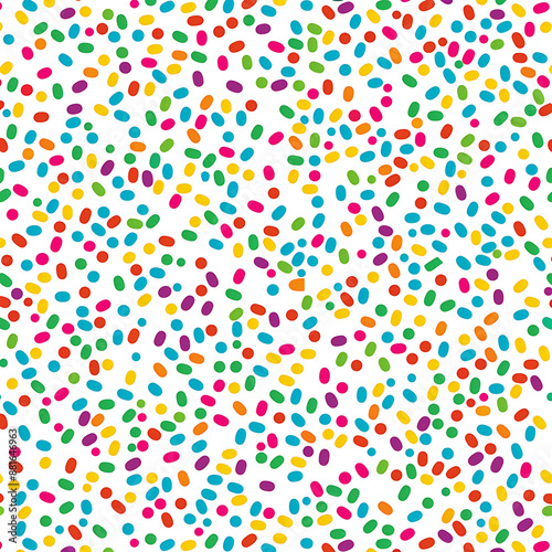 Seamless pattern featuring colorful confetti sprinkles scattered background