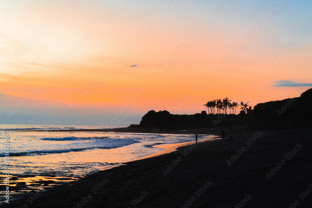 Sunset on the beach by the ocean, Indonesia. Sunset on the beach by the ocean, Indonesia.
