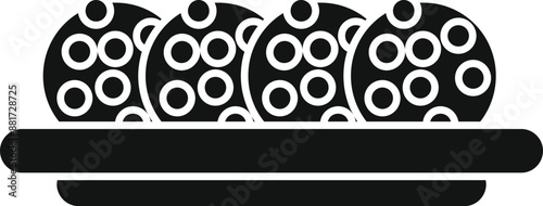 Four falafel balls are laying on a plate, ready to be eaten