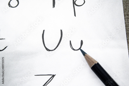 PENCIL AND ALPHABET LETTER U