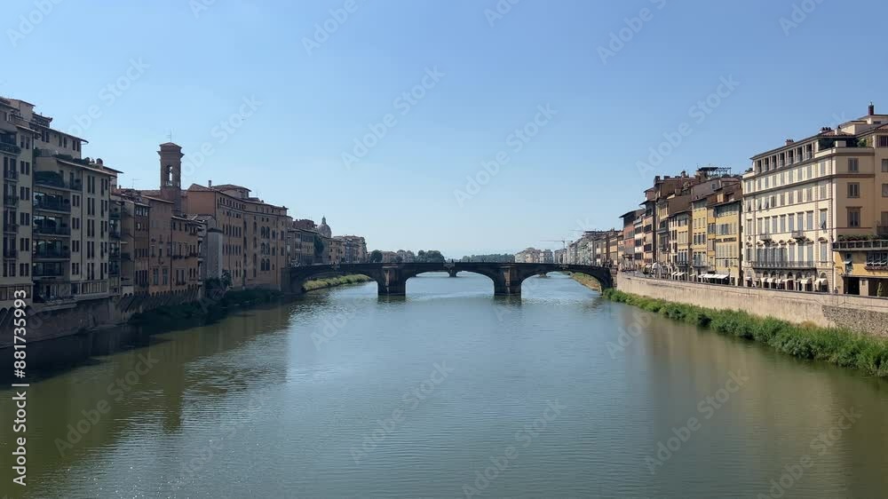 Arno river in Florence overview of the bridge in sunny day. High quality 4k footage Arno river in Florence overview of the bridge in sunny day. High quality 4k footage