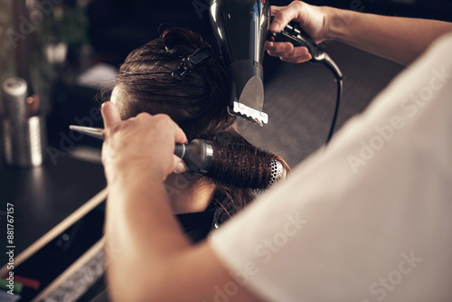 Hairdresser, woman and client with hairdryer at salon for heat treatment, maintenance and haircare of change. People, designer and tools for consultation session, blowout and style at luxury service