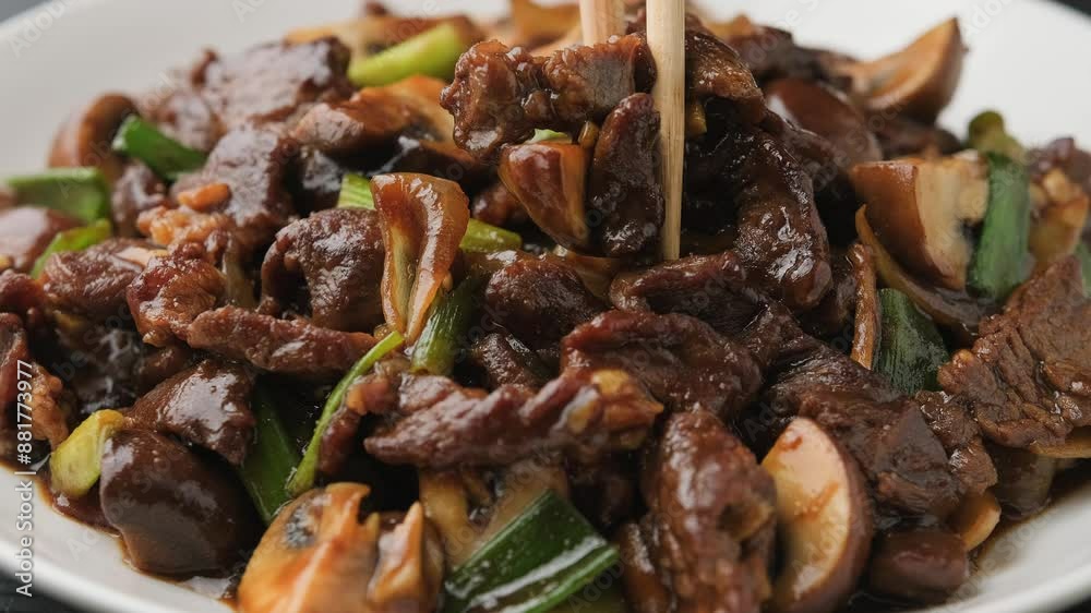 Eating Beef Mushroom Stir Fry with ginger and garlic. Eating Beef Mushroom Stir Fry with ginger and garlic.