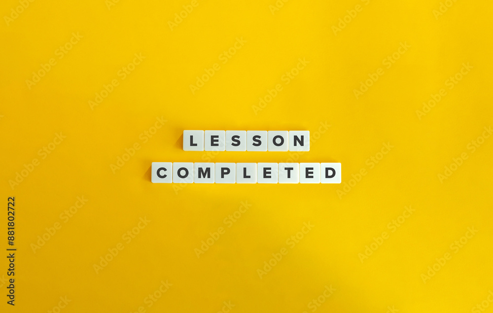 Lesson Completed Banner. Text on Block Letter Tiles on Yellow Background. Minimal Aesthetic. Lesson Completed Banner. Text on Block Letter Tiles on Yellow Background. Minimal Aesthetic.