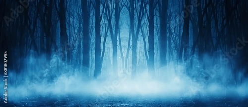 A mysterious, foggy forest in deep blue hues with towering trees creating a spooky, atmospheric scene perfect for fantasy or horror themes.