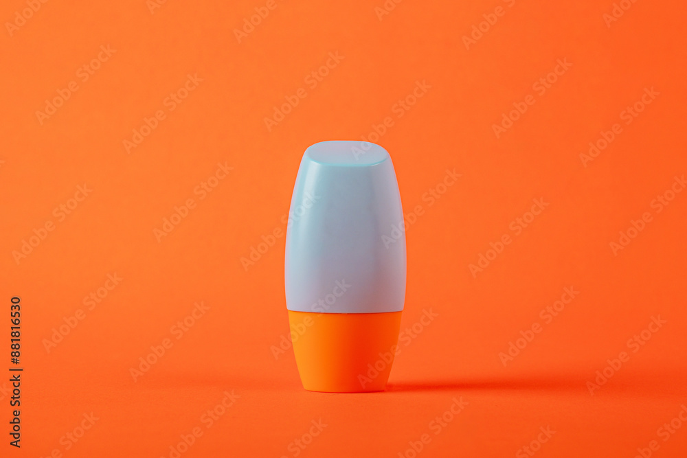 Blank tube with cosmetic product for moisturizing on orange background Blank tube with cosmetic product for moisturizing on orange background