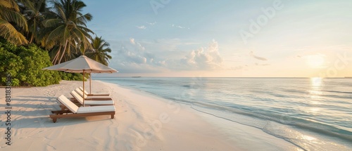 A luxurious beach resort featuring private cabanas and sun loungers, offering a serene and tranquil coastal getaway