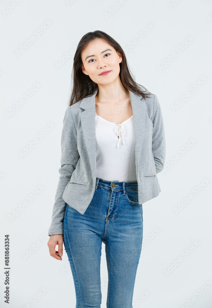Asian female attractive smiling happy cheerful successful employee businesswoman, she wearing casual classic blazer and standing on white background isolated studio portrait. Lifestyle concept. Asian female attractive smiling happy cheerful successful employee businesswoman, she wearing casual classic blazer and standing on white background isolated studio portrait. Lifestyle concept.
