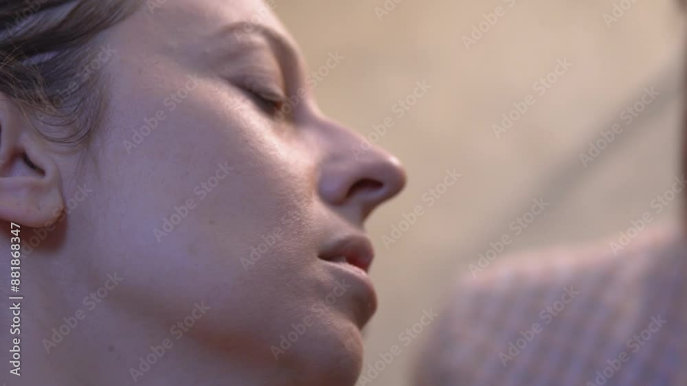 A detailed close-up of a makeup artist skillfully working on a model's eye makeup A detailed close-up of a makeup artist skillfully working on a model's eye makeup
