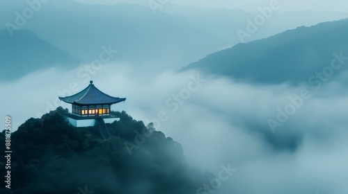 Wallpaper Mural A peaceful scene of a Buddhist temple on a mountain top, enveloped in clouds and glowing in the soft light of dawn, symbolizing tranquility and spirituality Torontodigital.ca
