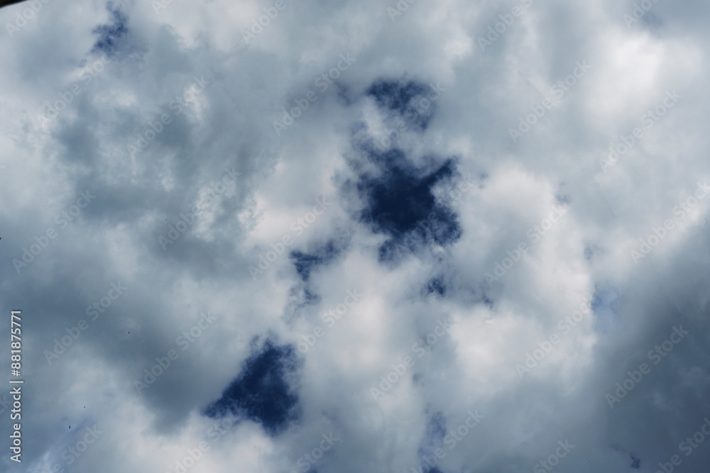 sky is overhead . white cumulus clouds floating across the sky, daytime sky, screensaver sky, background