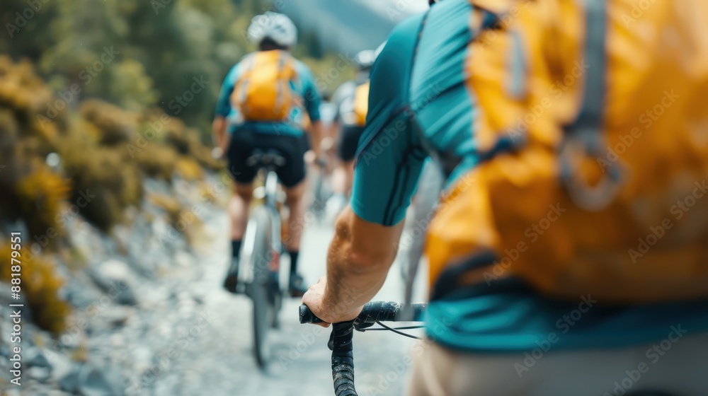 Cyclists with backpacks navigate a rugged, rocky trail through a picturesque natural setting, embodying adventure and the joy of outdoor exploration and physical activity. Cyclists with backpacks navigate a rugged, rocky trail through a picturesque natural setting, embodying adventure and the joy of outdoor exploration and physical activity.